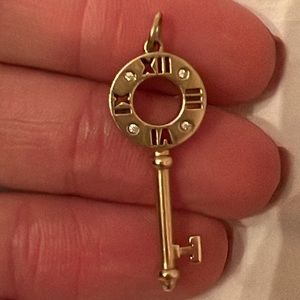 Original Tiffany & Co gold key with diamonds